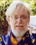 Dan O'Bannon, apparently wearing some sort of bathrobe or kimono.