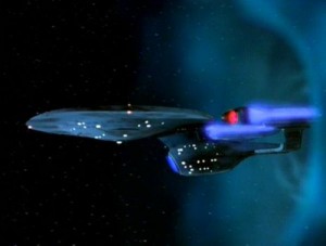 The Enterprise C emerges from a temporal rift.