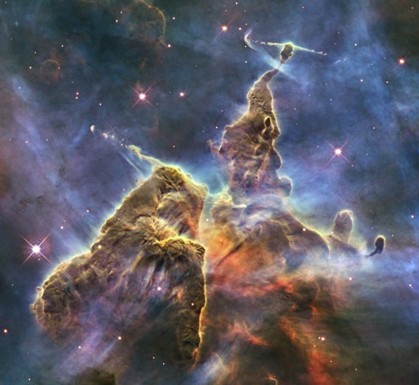 This is a Hubble telescope image of a gas cloud from the Carina Nebula. It's more than three light-years tall.  I don't care what your political views are - that's cool.
