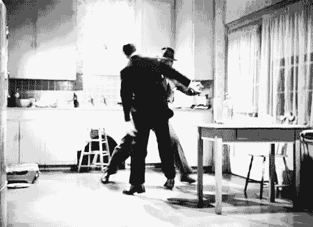 GIF of a fistfight from an old movie