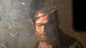 Walter White looking into broken mirror