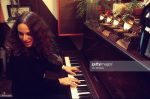 Carole King Plays Piano