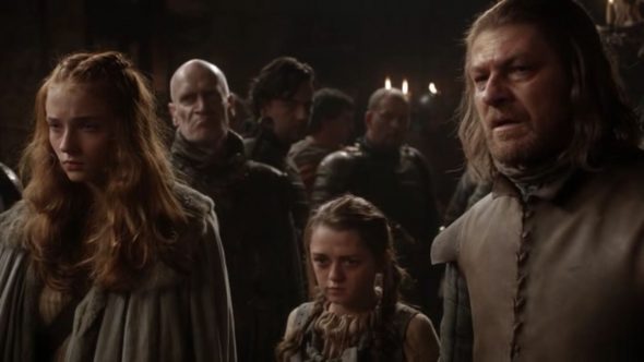 Sansa, Arya, and Ned in Game of Thrones.